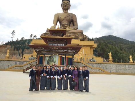 Common picture with the Schoolgirls in front of Buddha statue in Thimphu